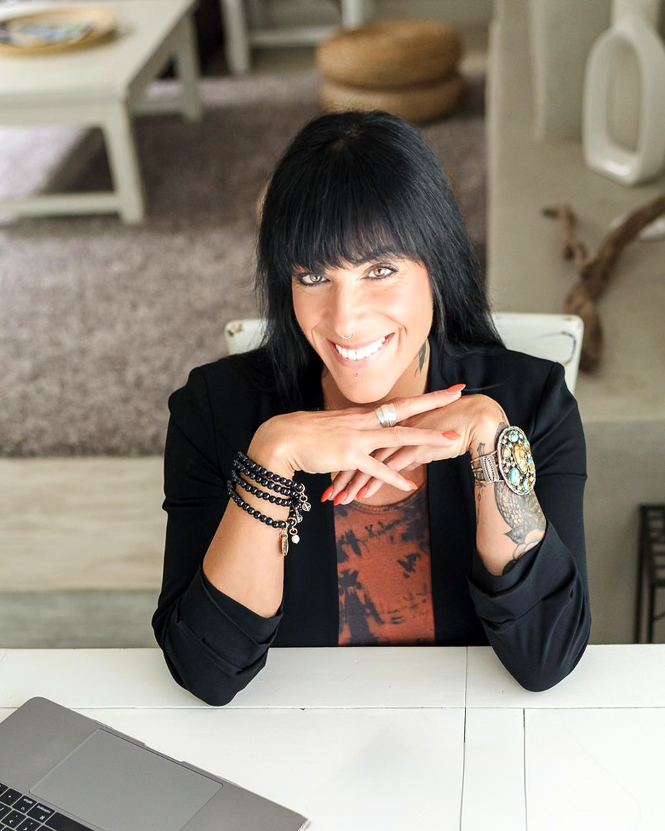Cristina Dolores at her desk